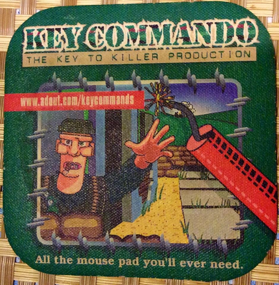 Key Commando mousepad — the in-house keyboard shortcut training game built at AdOut